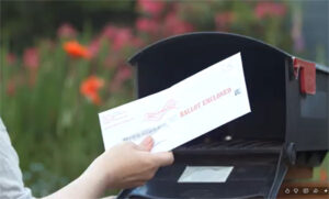 Ballot being removed from mailbox