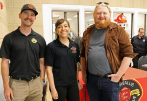 Gabe Shepherd, right, Benton County commissioner, Sierra Anderson, City of Corvallis emergency manager, and Leo Williamson, a forester with the Oregon Department of Forestry, pause for a photo during the Wildfire Readiness Fair in Corvallis on May 2.
